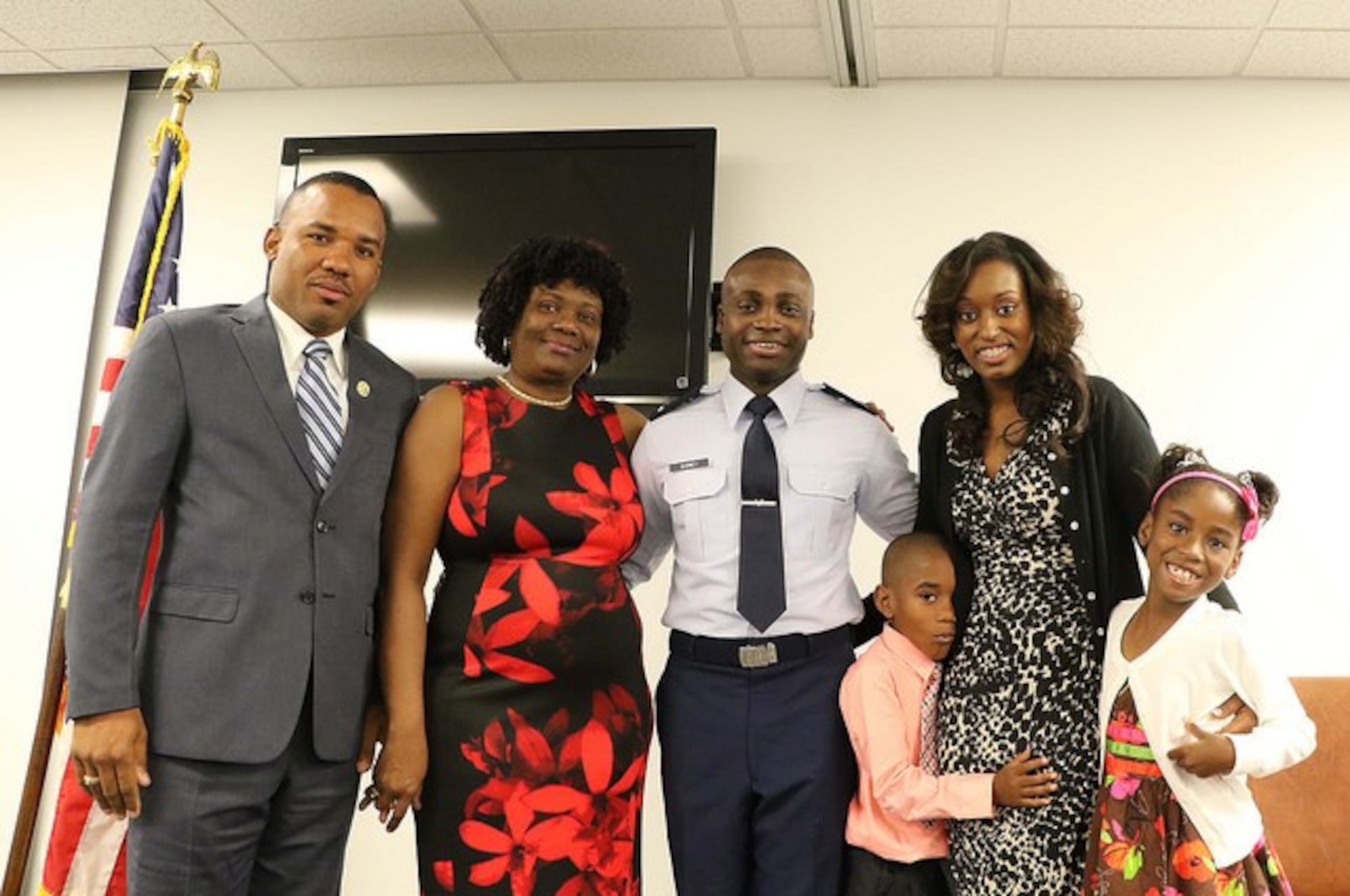 1st Lt. Carl Sidney 45th Aeromedical Evacuation Squadron executive officer, poses for a photo during his pin-on ceremony at MacDill Air Force Base, FL on Nov. 5, 2016. Prior to joining the 45 AES, Sidney served in the Army National Guard as an Automated Logistical Specialist. (U.S. Air Force photo by Senior Airman Xavier Lockley)