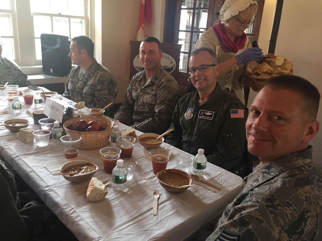 Col. Brian Bowman along with other members of the 914th Airlift Wing enjoy and 18th Century lunch a Old Fort Niagara, Youngstown, N.Y. during the 22nd Air Force conference, November 3, 2016. (courtesy photo) 