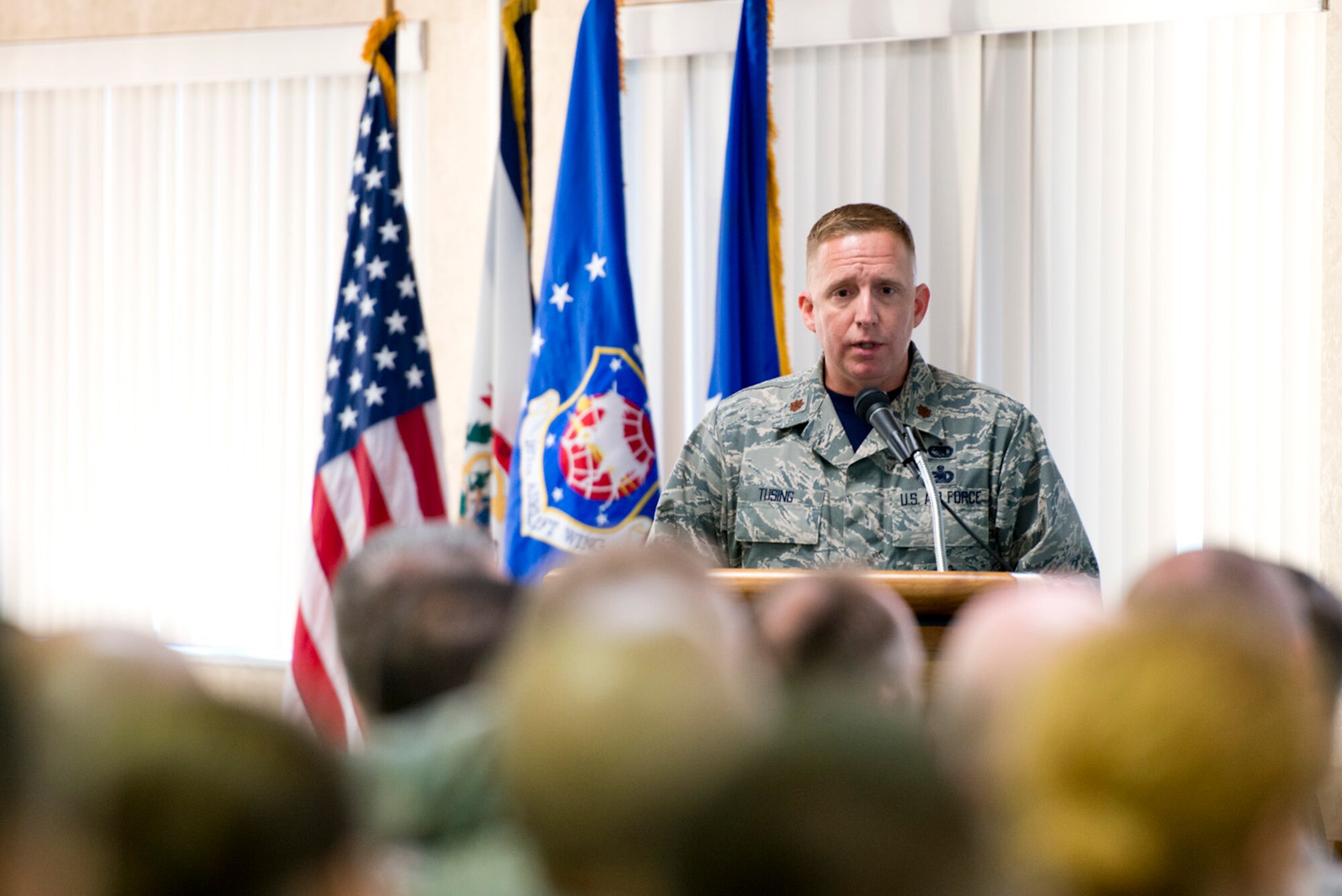 Major Christopher Tusing, the 167th Airlift Wing's director of inspections, addresses
the Air Mobility Command Inspector General and his inspection team during the Wing's
capstone event in-brief Nov. 4. (U.S. Air National Guard photo by Senior Master Sgt. Emily Beightol-Deyerle)
