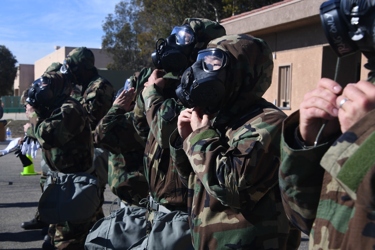 U.S. Air National Guardsmen at the 146th Airlift Wing participate in an Expeditionary Skills Rodeo on November 4, 2016. Exercise, Exercise, Exercise Code Red! Participants don MOPP four (Mission-Oriented Protective Posture). U.S. Air National Guard photo by Senior Airman Madeleine Richards/Released)