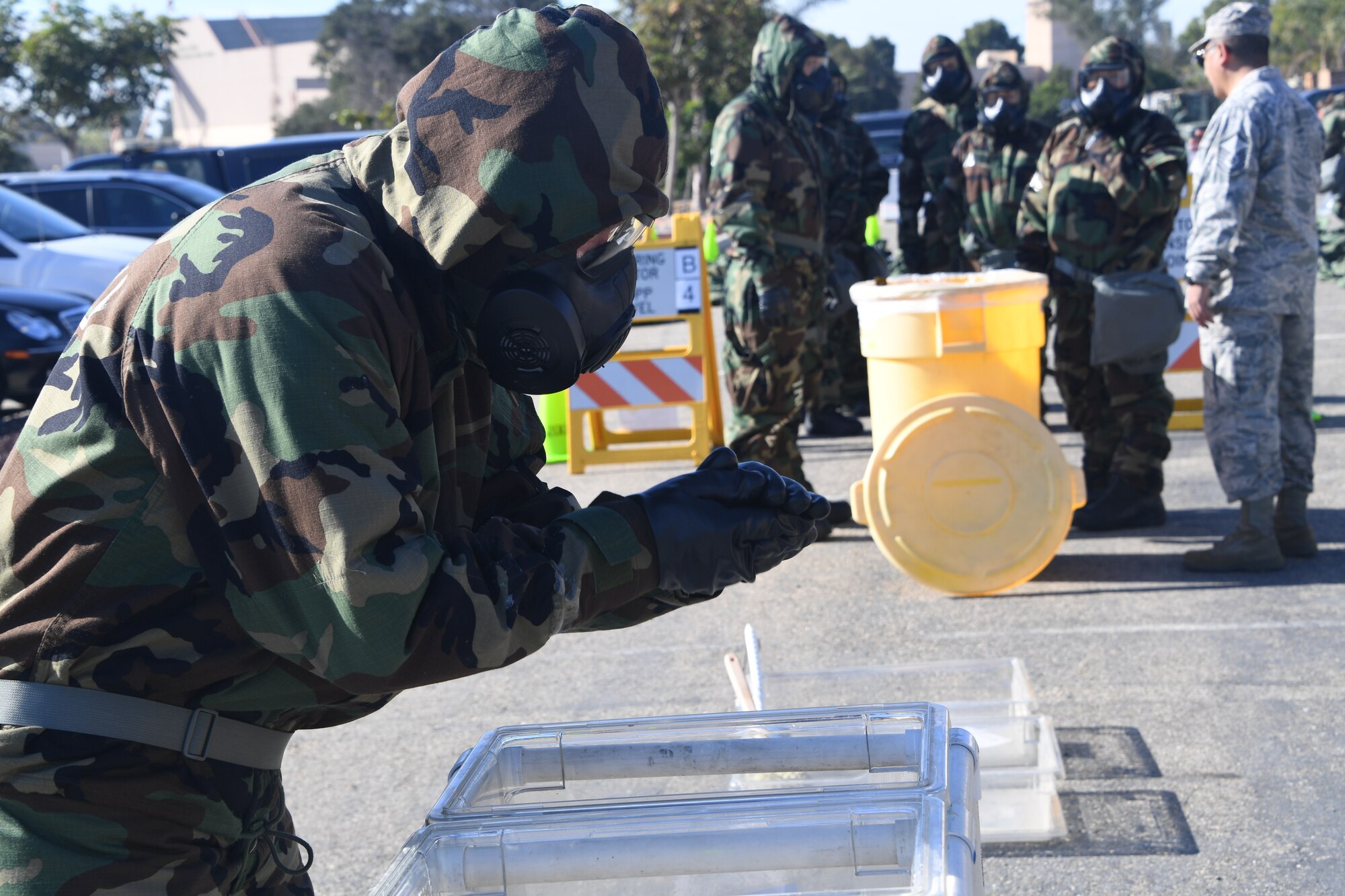 U.S. Air National Guardsmen at the 146th Airlift Wing participate in an Expeditionary Skills Rodeo on November 4, 2016. The decontamination is s station participants had to demonstrate skills for the wing inspection team.(U.S. Air National Guard photo by Senior Airman Madeleine Richards/Released)