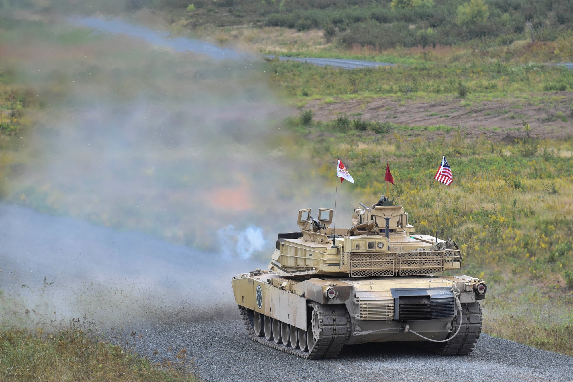 Members of the 278th Armored Cavalry Regiment in Knoxville, Tenn., fire their first shot during the direct fire section of the Wotherington Challenge. The Worthington Challenge is an internatoinal armored crew competition, hosted by the Canadian Army, focused on showing armed crew skills as well as sharing best training practices amongst allies.(Air Force photo by Senior Airman Leon Bussey / Released) (US Air Force photo by Senior Airman Leon Bussey / Released)