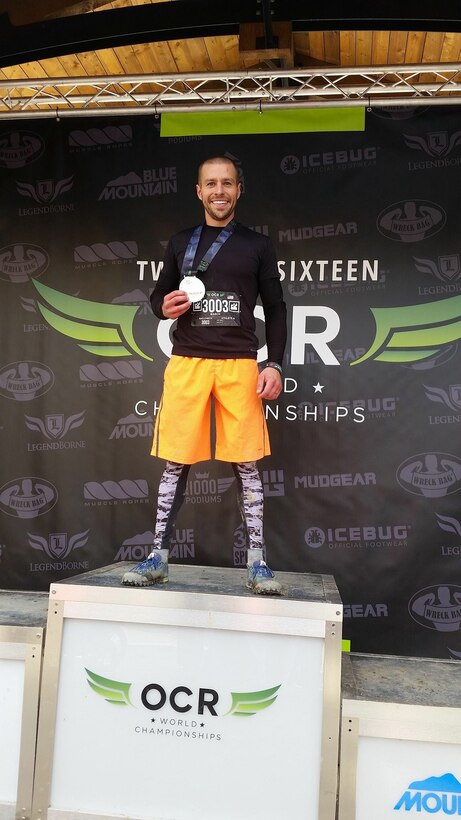 Staff Sgt. Josh March, a chaplain’s assistant with the 193rd Special Operations Wing, Middletown, Pennsylvania, earns his finishers medal at the Obstacle Course Racing World Championships in Ontario, Canada, Oct. 14, 2016. March started participating for fun in these races in 2012, becoming more serious about competing and capturing his first win in early 2015. (Photo courtesy of Erin March/Released)