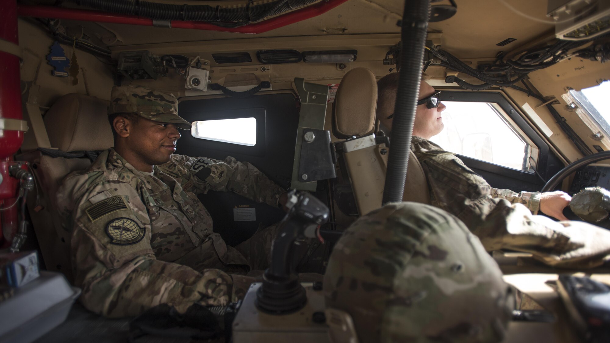 Senior Airmen James Curry and Tyler Phillips, 451st Expeditionary Support Squadron response force members, man their positions while standing guard at Kandahar Airfield, Afghanistan Nov. 5, 2016. Security forces members of the 451st ESS provide airfield security at Kandahar. (U.S. Air Force photo by Staff Sgt. Katherine Spessa)
