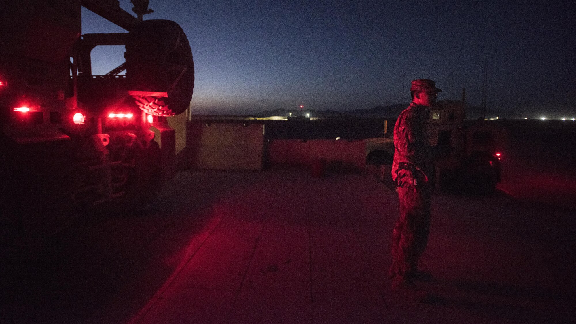 Staff Sgt. Limuel Beltran, 451st Expeditionary Support Squadron response force assistant flight chief, visits the D-1 post during shift at Kandahar Airfield, Afghanistan, Nov. 5, 2016. Response force members man both static and mobile posts around the airfield to maintain 360-degree security. (U.S. Air Force photo by Staff Sgt. Katherine Spessa)