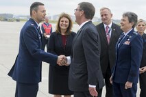 Col. Bradley McDonald, 88th Air Base Wing commander, shakes hands with Secretary of Defense Ash Carter after his arrival at Wright-Patterson Air Force Base, Ohio, Nov. 3, 2016. During his visit, Carter toured the Air Force Research Laboratory and Air Force Life Cycle Management Center to see the latest technologies being developed. (U.S. Air Force photo/Wesley Farnsworth)