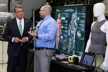 Dr. Josh Hagen, 711th Human Performance Wing briefs Secretary of Defense Ash Carter during his tour of the unit at Wright-Patterson Air Force Base, Ohio, Nov. 3, 2016. Hagen brief Carter on the latest in wearable sensor technology currently being developed by the 711 HPW. (U.S. Air Force photo by Wesley Farnsworth)