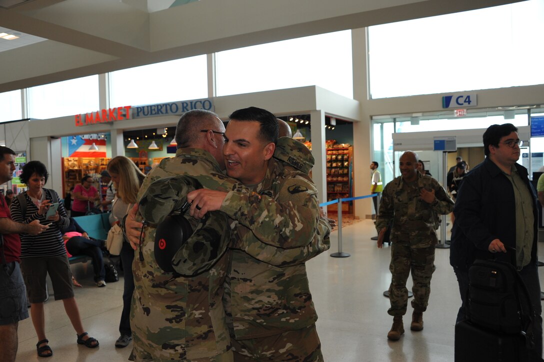 Capt. Orlando Garcia is "welcomed back" by 1st Mission Support Command Leadership at the Luis Munoz Airport on November 4, 2016. The 271st HRC Casualty Liaison Team was deployed to Afghanistan.