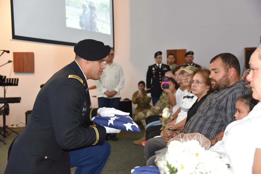 Army Reserve Soldiers from the 301st Military Police Company, family and friends gathered at the Fort Buchanan Chapel for a Memorial Service in honor of Sgt. Anthony William Bakogiannis, on November 5. During the Memorial Service, an American flag was presented to his brother, Alex Bakogiannis.