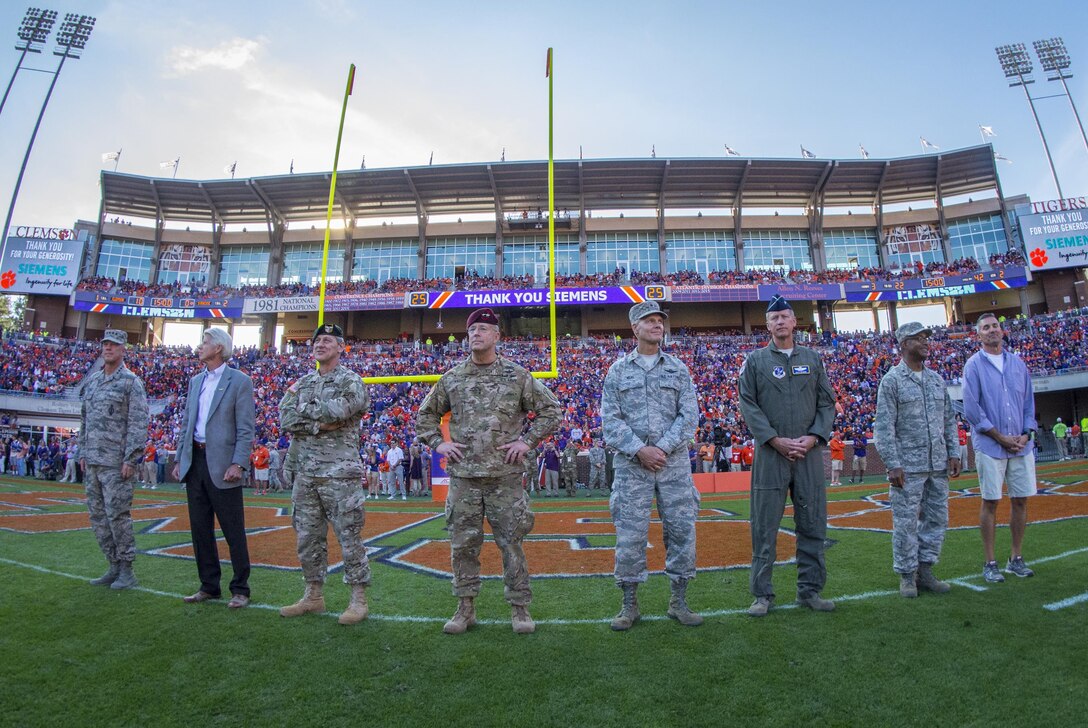 A constellation of stars: Eight U.S. military general officers recieve an ovation from 81,000 people in Clemson University’s Memorial Stadium during the Clemson Tigers’ Military Appreciation Game against Syracuse, Nov. 5, 2016. (U.S. Army photo by Staff Sgt. Ken Scar)
