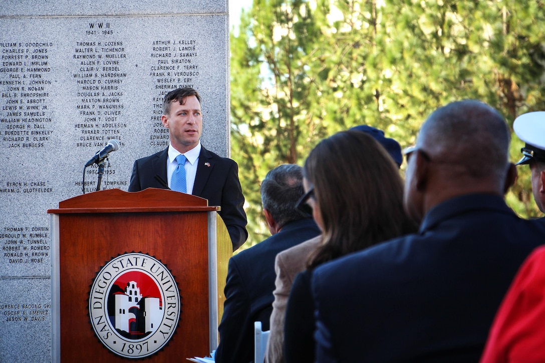 Jonathan Reiland, president of the Student Veterans Organization at San Diego State University, makes remarks at a wreath-laying ceremony at the War Memorial on Aztec Green at San Diego State University, San Diego, Nov. 4, 2016. Navy photo by Lt. Matthew Stroup