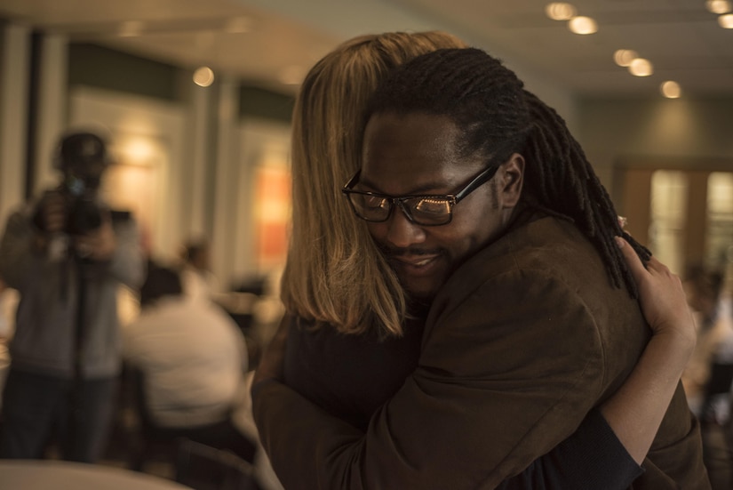 Veteran Reginald "Reggie" Des’Ravines embraces local WCNC news anchor Beth Troutman during a surprise dream day experience at the Johnson and Wales Culinary Arts School, Charlotte, N.C. Reggie received a VIP shopping experience at Sur La Table and opportunity to serve distinguished guests with his personal menu at The Fig Tree restaurant, Oct 27. (U.S. Army Reserve Photo by Sfc. Brian Hamilton, 108th Training Command (IET), Public Affairs)