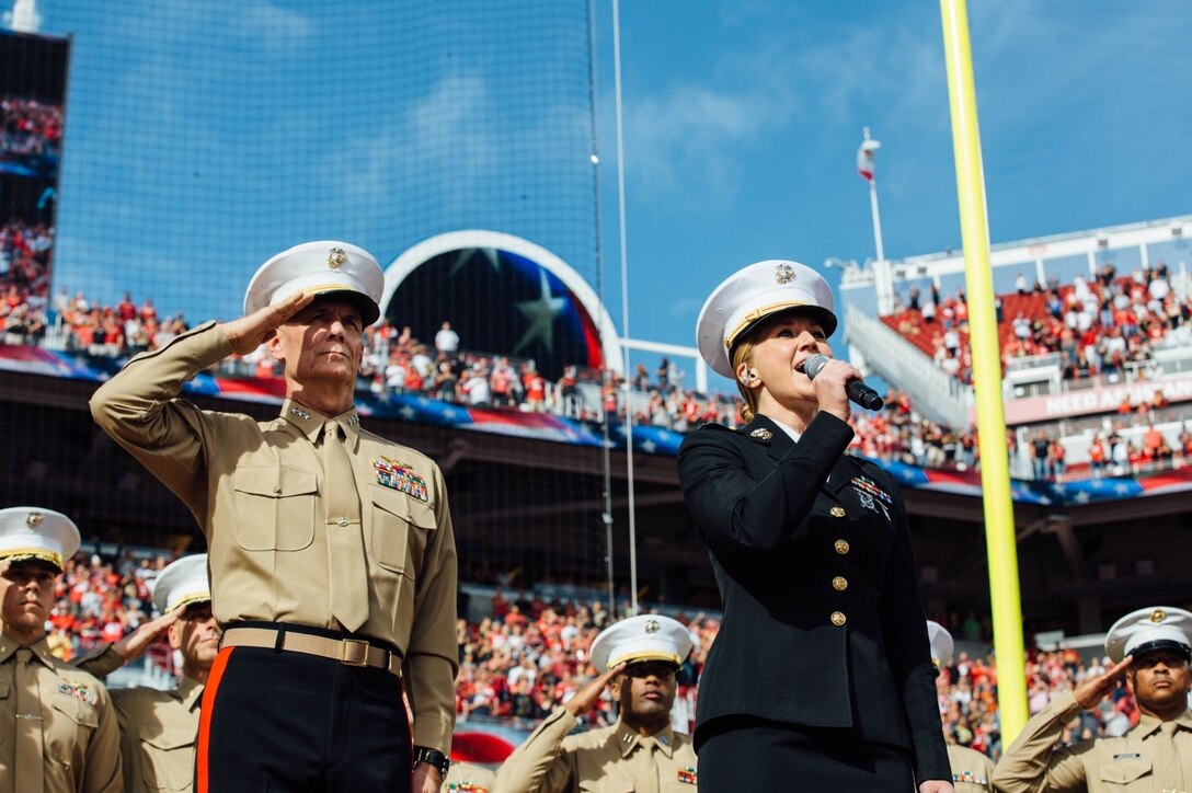 Lieutenant General Rex C. McMillian, commander of Marine Forces Reserve and Marine Forces North, salutes the American flag as Captain Skye Martin, public affairs officer for 12th Marine Corps Recruiting District, sings the national anthem during the opening ceremony of the San Francisco 49ers’ game against the New Orleans Saints at Levi’s Stadium, Nov. 6, 2016. McMillian was the National Football League’s guest of honor at the game as part of its “Salute to Service” campaign. Today, approximately 500 Reserve Marines are providing fully integrated operational support to Fleet and Combatant Commanders around the world. For more information on the history and heritage of Marine Forces Reserve as well as current Marine stories and upcoming Centennial events, please visit www.marines.mil/usmcr100. (U.S. Marine Corps photo by Lance Cpl. Dallas Johnson)