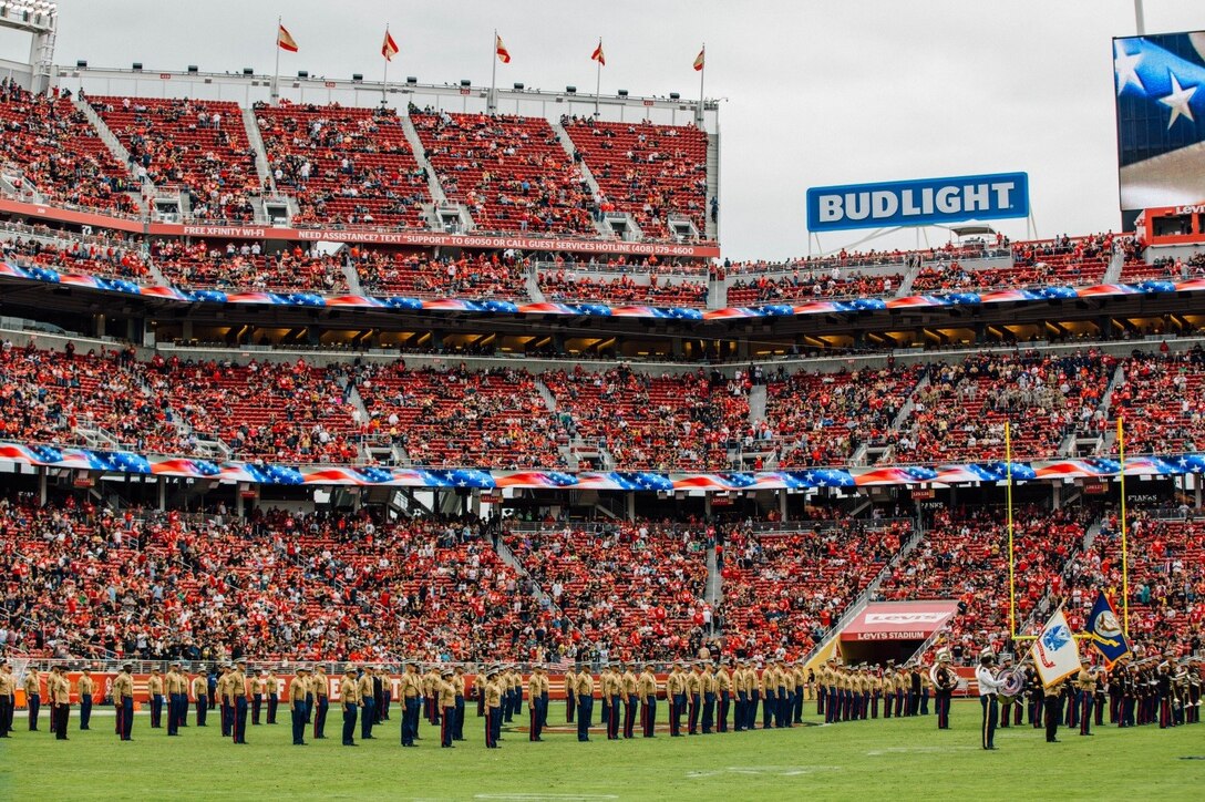 Service members from the San Francisco Bay Area stand at attention during the Marines Hymn, performed by the 1st Marine Division Band at half-time of the San Francisco 49ers’ game against the New Orleans Saints at Levi’s Stadium, Nov. 6, 2016. The Centennial of the Marine Forces Reserve was recognized as part of the National Football League’s “Salute to Service” campaign.  Today, approximately 500 Reserve Marines are providing fully integrated operational support to Fleet and Combatant Commanders around the world.  For more information on the history and heritage of Marine Forces Reserve as well as current Marine stories and upcoming Centennial events, please visit www.marines.mil/usmcr100. (U.S. Marine Corps photo by Lance Cpl. Dallas Johnson)