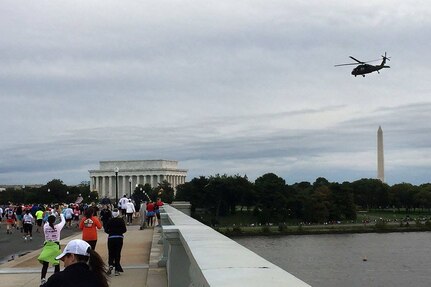 An Army Blackhawk rotary wing aircraft hovers over the Thomas Jefferson Memorial in Washington D.C. during the 32nd annual Army Ten-Miler, Oct. 9, 2016. Army Reserve Soldiers assigned to the 85th Support Command and First Army formations were but a few of the tens of thousands Soldiers who participated in the race.
(Courtesy photo)