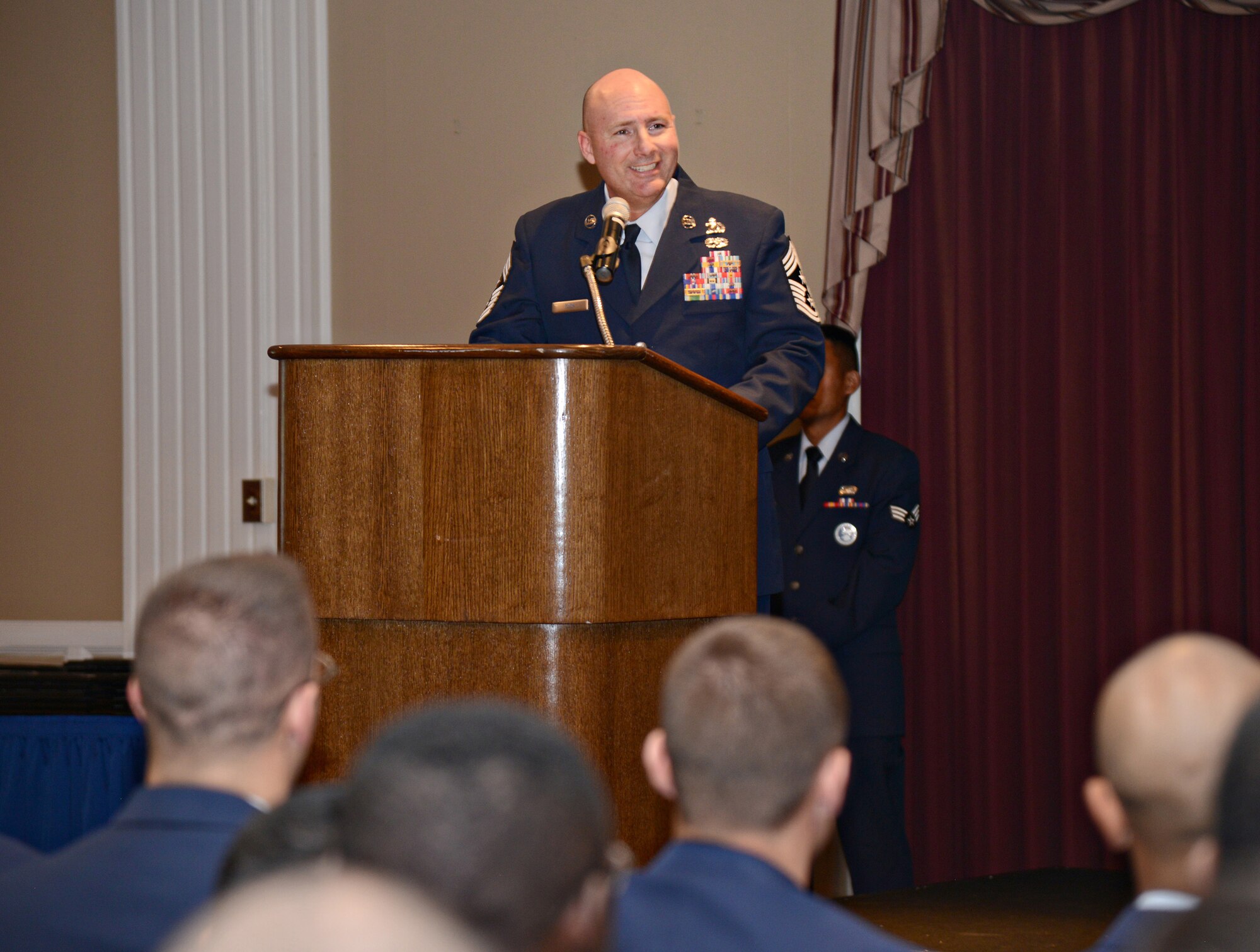 72nd Air Base Wing Command Chief Master Sgt. David Tuck was the commencement speaker during the Oct. 25 Community College of the Air Force graduation ceremony. 148 of Tinker’s Airmen graduated from CCAF, receiving 156 degrees in 37 different areas of study. (Air Force photo by Kelly White)