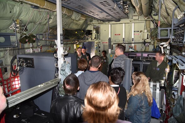 Civilian employers are given a tour of a WC130J, used to fly hurricanes, by members of the 53rd Weather Reconnaissance Squadron during the 403rd Wing Employer Day, Nov. 5.  The employers received a flight, tour and demonstrations of the different jobs and training that their Air Force Reserve employees do when performing military service. (U.S. Air Force photo/Master Sgt. Jessica Kendziorek) 