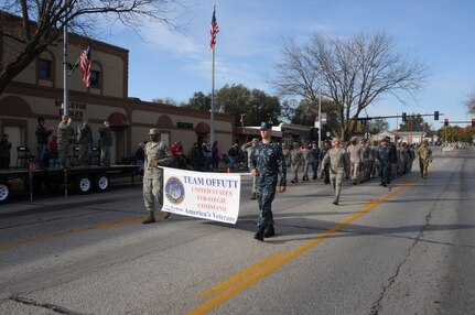 Members of U.S. Strategic Command (USSTRATCOM) march in the 2016 Veteran’s Day Parade in Bellevue, Neb., Nov. 5, 2016. Senior leaders from USSTRATCOM and the 55th Wing also attended the seventeenth annual parade to support the service members from their respective commands who volunteered to participate and honor U.S. veterans, both past and present. (USSTRATCOM photo by Steve Cunningham)