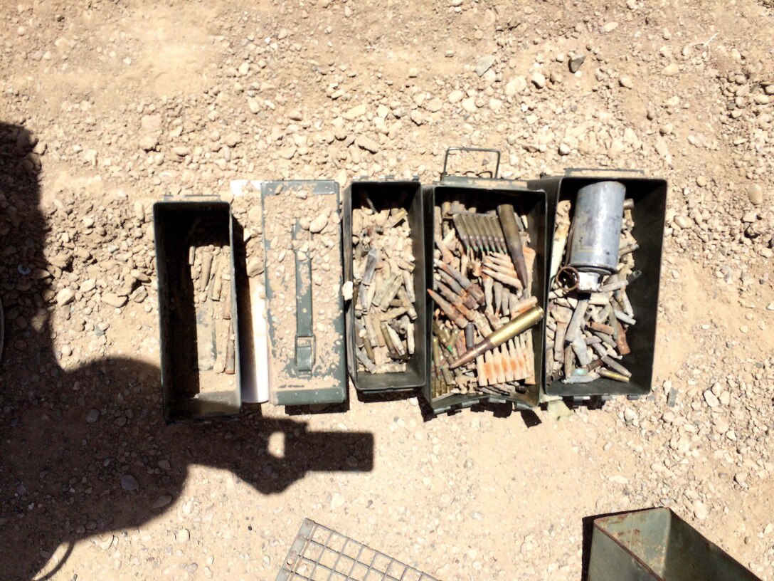 Two days’ worth of munitions removed during “ammo abatement” process to ensure vehicles are free from dangerous items before DEMIL work begins. Items shown include smoke grenades and .50 caliber rounds.