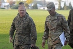 Army Brig. Gen. Charles Hamilton, DLA Troop Support commander (right), greets Gen. Robert B. Neller, commandant of the Marine Corps, as he arrives for a visit to DLA Troop Support in Philadelphia Nov. 2