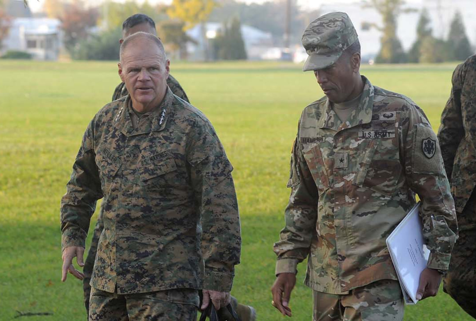 Army Brig. Gen. Charles Hamilton, DLA Troop Support commander (right), greets Gen. Robert B. Neller, commandant of the Marine Corps, as he arrives for a visit to DLA Troop Support in Philadelphia Nov. 2