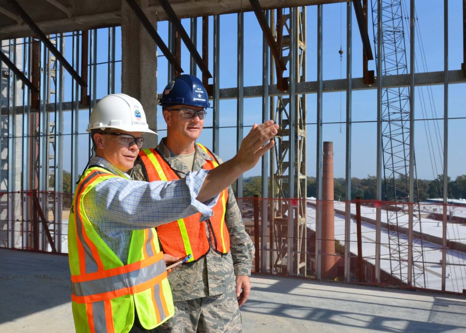 Defense Logistics Agency Aviation Commander Air Force Brig. Gen. Allan Day, and DLA Installation Support at Richmond Site Director David Gibson, tour the construction site on Phase I of the DLA Aviation Operations Center being constructed on Defense Supply Center Richmond, Virginia, Nov. 3, 2016.