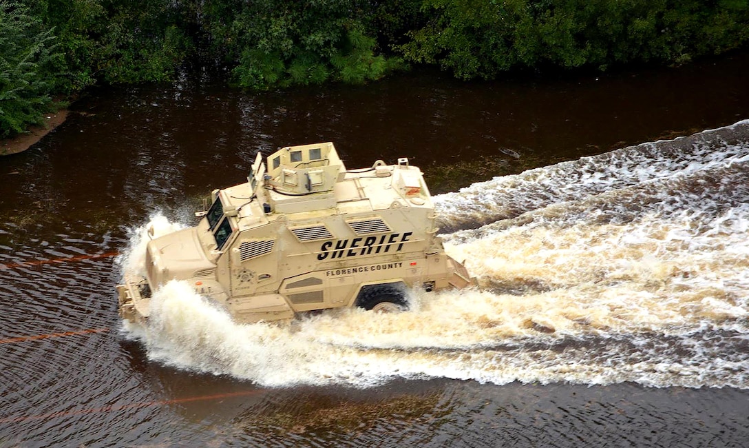 A mine resistant, ambush protected vehicle was used to extract people day and night from flooded areas in Florence County, North Carolina.