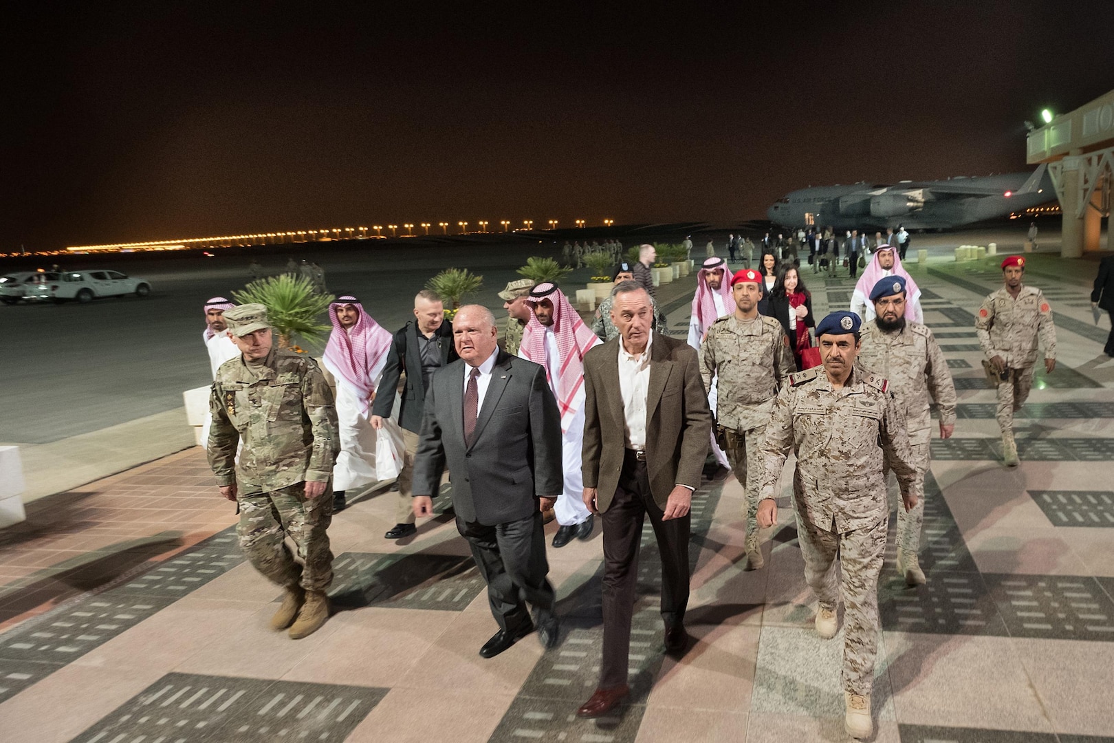 Saudi and American officers escort Marine Corps Gen. Joe Dunford from his C-17 after he arrived in Riyadh, Saudi Arabia, Nov. 7, 2016. The general will meet with U.S. and Saudi officials for discussions about issues of mutual concern. DoD photo by D. Myles Cullen