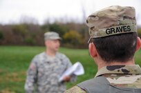 Sgt. David Graves, a public affairs broadcast specialist from Nashville, Tennessee assigned to the U.S. Army Reserve’s 372nd Mobile Public Affairs Detachment, receives instructions from Sgt. 1st Class Corey Beal prior to going onto the range at Camp Atterbury, Indiana Nov. 3.  Army Reserve Soldiers qualify on their individual assigned weapon once a year in order to be “mission capable” should they need to deploy.