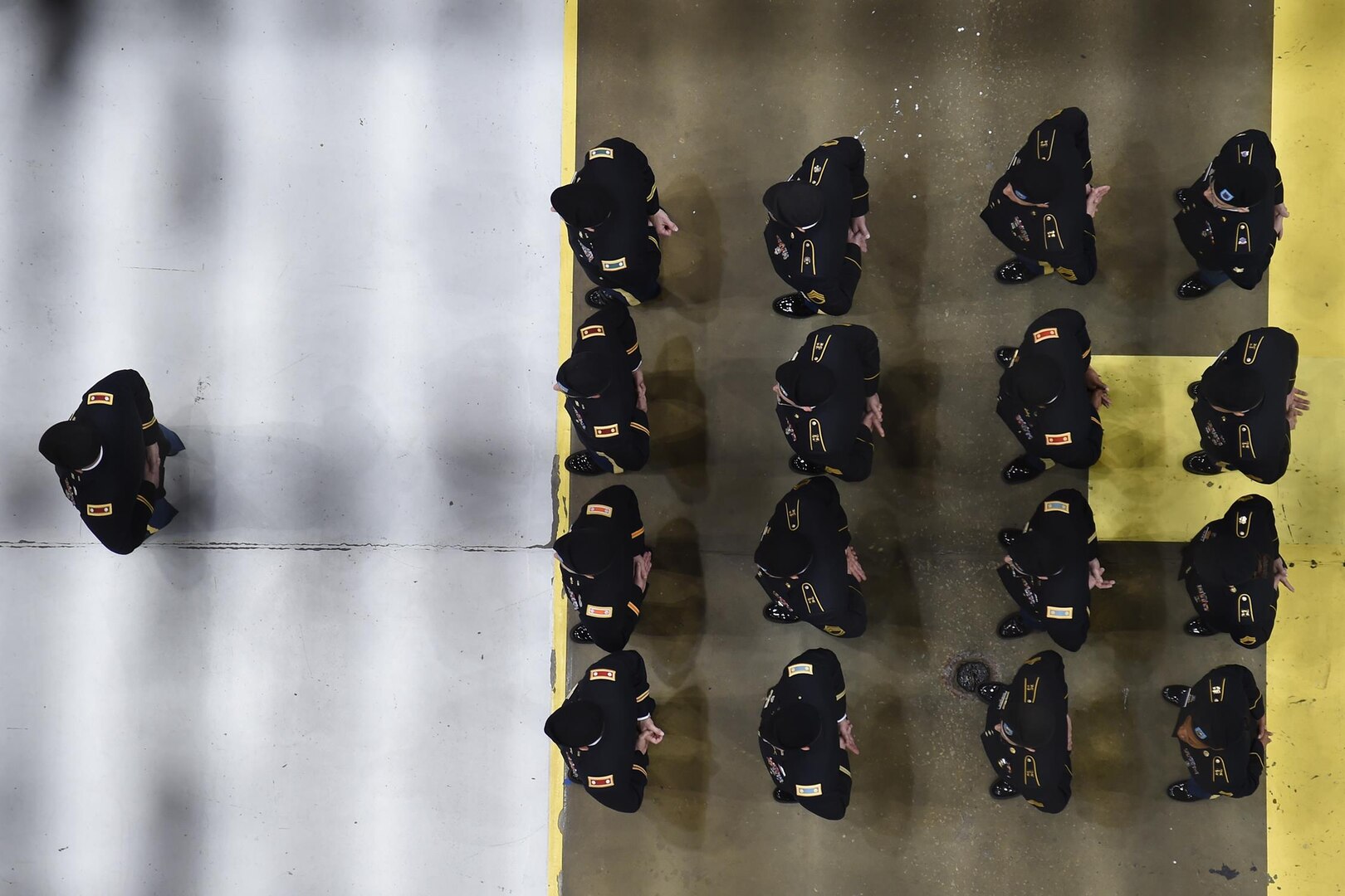 Soldiers stand in formation during the U.S. Strategic Command (USSTRATCOM) change of command ceremony at Offutt Air Force Base, Neb., Nov. 3, 2016. Secretary of Defense Ash Carter presided over the change of command and provided remarks during which he thanked Adm. Cecil D. Haney, outgoing USSTRATCOM commander, for his service. He also congratulated Gen. John E. Hyten on his appointment as the new USSTRATCOM commander. Additionally, Chairman of the Joint Chiefs of Staff Gen. Joseph F. Dunford provided remarks during the ceremony and presented the Joint Meritorious Unit Award to USSTRATCOM. Hyten previously served as commander of Air Force Space Command, and Haney will retire from active military duty during a separate ceremony in January. One of nine DoD unified combatant commands, USSTRATCOM has global strategic missions assigned through the Unified Command Plan that include strategic deterrence; space operations; cyberspace operations; joint electronic warfare; global strike; missile defense; intelligence, surveillance and reconnaissance; combating weapons of mass destruction; and analysis and targeting. (U.S. Navy photo by Petty Officer 1st Class Byron C. Linder)