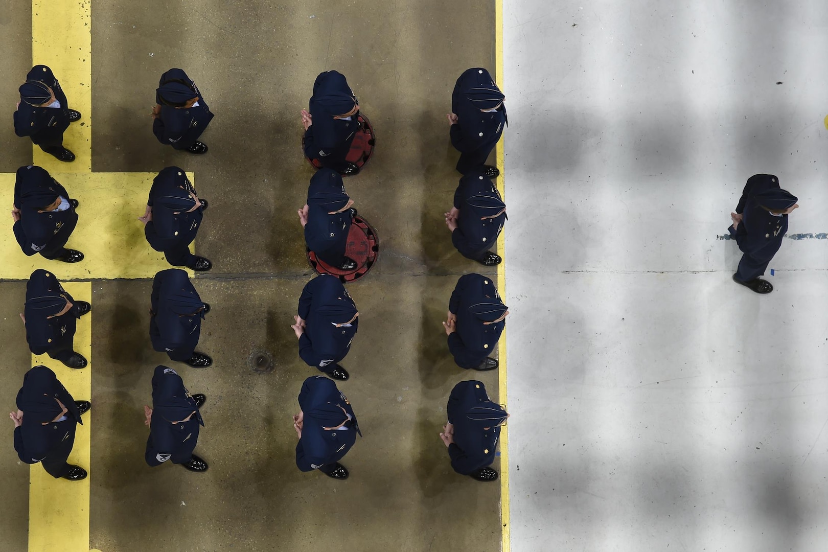 Airmen stand in formation during the U.S. Strategic Command (USSTRATCOM) change of command ceremony at Offutt Air Force Base, Neb., Nov. 3, 2016. Secretary of Defense Ash Carter presided over the change of command and provided remarks during which he thanked Adm. Cecil D. Haney, outgoing USSTRATCOM commander, for his service. He also congratulated Gen. John E. Hyten on his appointment as the new USSTRATCOM commander. Additionally, Chairman of the Joint Chiefs of Staff Gen. Joseph F. Dunford provided remarks during the ceremony and presented the Joint Meritorious Unit Award to USSTRATCOM. Hyten previously served as commander of Air Force Space Command, and Haney will retire from active military duty during a separate ceremony in January. One of nine DoD unified combatant commands, USSTRATCOM has global strategic missions assigned through the Unified Command Plan that include strategic deterrence; space operations; cyberspace operations; joint electronic warfare; global strike; missile defense; intelligence, surveillance and reconnaissance; combating weapons of mass destruction; and analysis and targeting. (U.S. Navy photo by Petty Officer 1st Class Byron C. Linder) 
