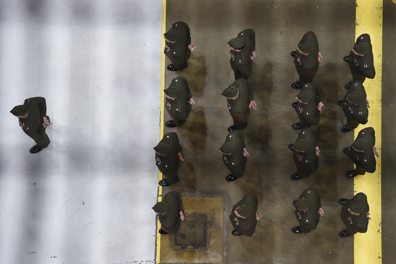 Marines stand in formation during the U.S. Strategic Command (USSTRATCOM) change of command ceremony at Offutt Air Force Base, Neb., Nov. 3, 2016. Secretary of Defense Ash Carter presided over the change of command and provided remarks during which he thanked Adm. Cecil D. Haney, outgoing USSTRATCOM commander, for his service. He also congratulated Gen. John E. Hyten on his appointment as the new USSTRATCOM commander. Additionally, Chairman of the Joint Chiefs of Staff Gen. Joseph F. Dunford provided remarks during the ceremony and presented the Joint Meritorious Unit Award to USSTRATCOM. Hyten previously served as commander of Air Force Space Command, and Haney will retire from active military duty during a separate ceremony in January. One of nine DoD unified combatant commands, USSTRATCOM has global strategic missions assigned through the Unified Command Plan that include strategic deterrence; space operations; cyberspace operations; joint electronic warfare; global strike; missile defense; intelligence, surveillance and reconnaissance; combating weapons of mass destruction; and analysis and targeting. (U.S. Navy photo by Petty Officer 1st Class Byron C. Linder) 