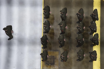 Marines stand in formation during the U.S. Strategic Command (USSTRATCOM) change of command ceremony at Offutt Air Force Base, Neb., Nov. 3, 2016. Secretary of Defense Ash Carter presided over the change of command and provided remarks during which he thanked Adm. Cecil D. Haney, outgoing USSTRATCOM commander, for his service. He also congratulated Gen. John E. Hyten on his appointment as the new USSTRATCOM commander. Additionally, Chairman of the Joint Chiefs of Staff Gen. Joseph F. Dunford provided remarks during the ceremony and presented the Joint Meritorious Unit Award to USSTRATCOM. Hyten previously served as commander of Air Force Space Command, and Haney will retire from active military duty during a separate ceremony in January. One of nine DoD unified combatant commands, USSTRATCOM has global strategic missions assigned through the Unified Command Plan that include strategic deterrence; space operations; cyberspace operations; joint electronic warfare; global strike; missile defense; intelligence, surveillance and reconnaissance; combating weapons of mass destruction; and analysis and targeting. (U.S. Navy photo by Petty Officer 1st Class Byron C. Linder) 