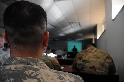 Sgt. Marco Gutierrez, a public affairs specialist from Indianapolis, Indiana assigned to the U.S. Army Reserve’s 350th Public Affairs Detachment, listen to a block of instruction during Master Resilience Training at Muscatatuck Urban Training Center, Indiana Nov. 4.  MRT is a key component of the Comprehensive Solider Fitness program.  Serving in the Army is much more than being physically fit; it is about mental and emotional strength as well.