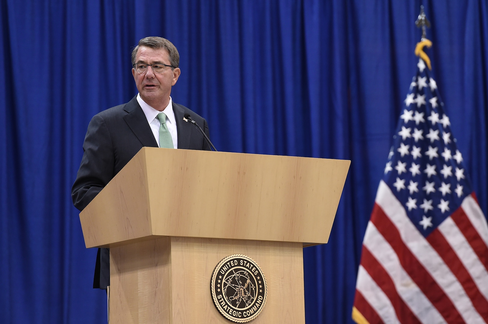 Secretary of Defense Ash Carter provides remarks during the U.S. Strategic Command (USSTRATCOM) change of command ceremony at Offutt Air Force Base, Neb., Nov. 3, 2016. Carter, who presided over the change of command, congratulated Gen. John E. Hyten on his appointment as the new USSTRATCOM commander. He also thanked Adm. Cecil D. Haney, outgoing USSTRATCOM commander, for his service. Additionally, Chairman of the Joint Chiefs of Staff Gen. Joseph F. Dunford provided remarks during the ceremony and presented the Joint Meritorious Unit Award to USSTRATCOM. Hyten previously served as commander of Air Force Space Command, and Haney will retire from active military duty during a separate ceremony in January. One of nine DoD unified combatant commands, USSTRATCOM has global strategic missions assigned through the Unified Command Plan that include strategic deterrence; space operations; cyberspace operations; joint electronic warfare; global strike; missile defense; intelligence, surveillance and reconnaissance; combating weapons of mass destruction; and analysis and targeting. (U.S. Air Force photo by Staff Sgt. Jonathan Lovelady)