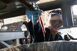 U.S. Air Force Airman 1st Class Sean Rippens, 33rd Helicopter Maintenance Unit HH-60G Pavehawk crew chief, drains the main gear box during a phase inspection at Kadena Air Base, Japan. A phase inspection or 600-hour inspection ensures that the aircraft stays maintained, serviceable and mission ready.