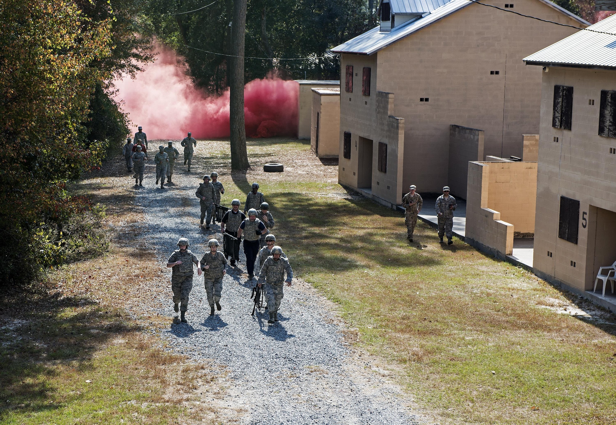 A team of medics respond to a simulated attack during an Emergency Medical Technician refresher course, Nov. 4, 2016, at Moody Air Force Base, Ga. The medics utilized the Military Operations in Urban Terrain village where they were tested on skills they’d spent the week refreshing. (U.S. Air Force photo by Airman 1st Class Janiqua P. Robinson)