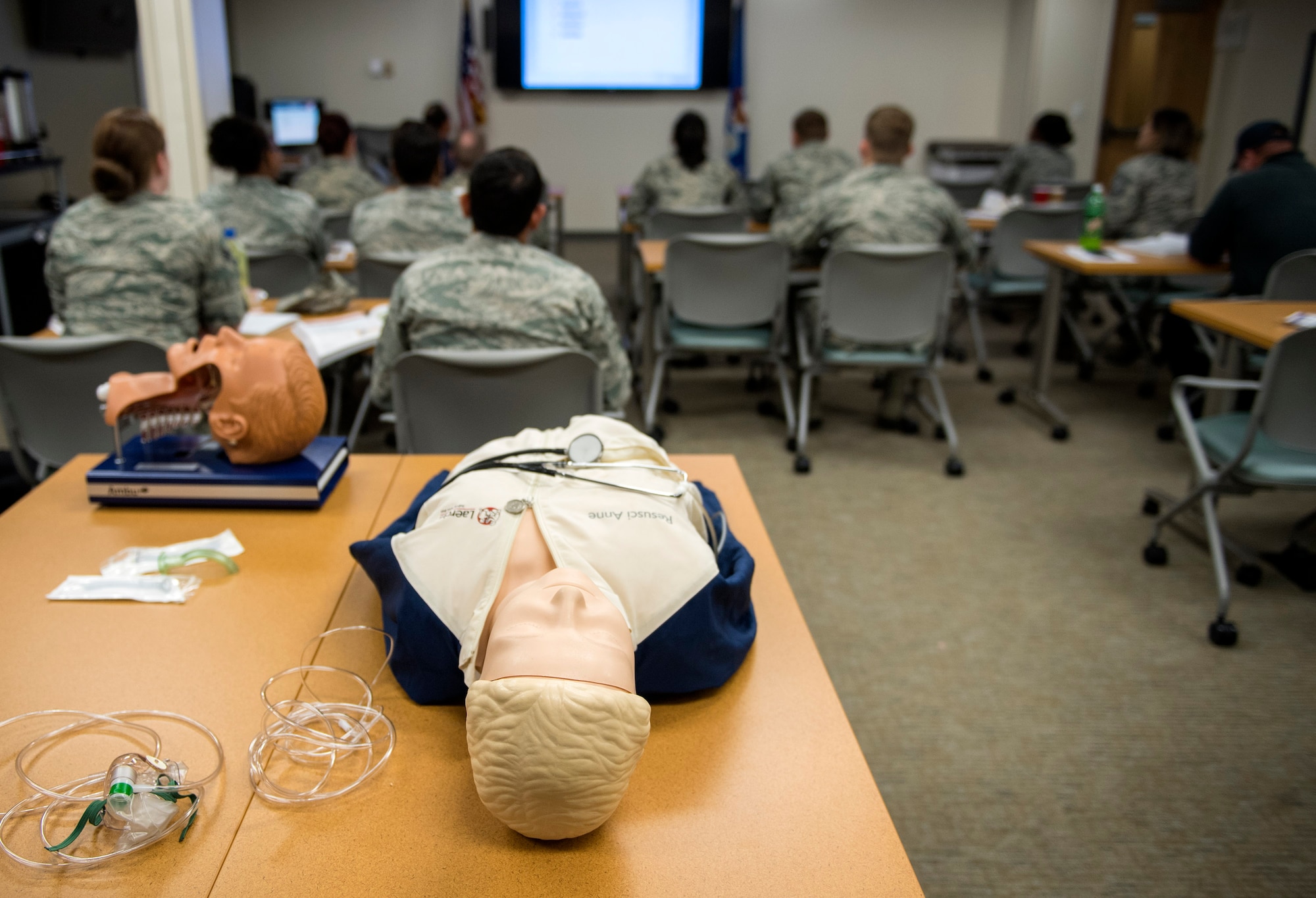 U.S. Air Force guard, reserve and active-duty Airmen and firefighters interact during an Emergency Medical Technician refresher course, Oct. 31, 2016, at Moody Air Force Base, Ga. The week-long training must be completed every two years. (U.S. Air Force photo by Airman 1st Class Janiqua P. Robinson)
