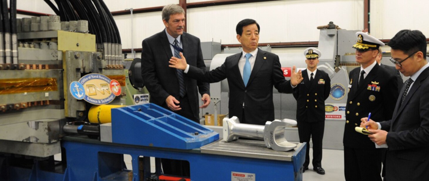 In this file photo, " Republic of Korea (ROK) Minister of National Defense Han Min-koo " who led the ROK delegation to see new and emerging technologies developed at Naval Surface Warfare Center Dahlgren Division (NSWCDD) " discusses electromagnetic railgun capabilities with his delegation and NSWCDD leadership, Oct. 19, 2016. Navy engineers briefed Han and his delegation on electromagnetic launchers, hypervelocity projectiles, and directed energy weapons, in addition to the command™s core capabilities in complex warfare systems development and integration to incorporate electric weapons technology into existing and future fighting forces and platforms.