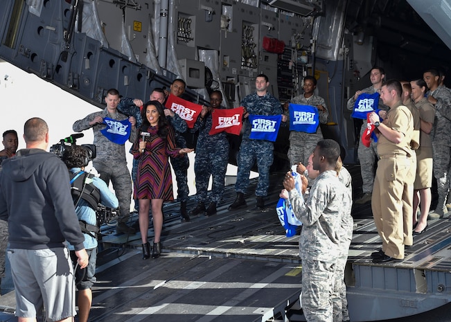 Molly Qerim, ESPN First Take host, broadcasts live from here during First Take’s week of Veteran’s Day program, Nov. 7, 2016. Every year ESPN First Take honors service members near Veterans Day by telecasting their show from a different base and highlights service members who go above and beyond in their careers.