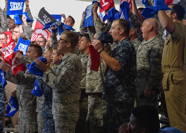 Members of Team Charleston cheer during ESPN’s First Take television program being broadcasted live here as part of First Take’s week of Veteran’s Day program, Nov. 7, 2016.  Every year ESPN First Take honors service members near Veterans Day by telecasting their show from a different base and highlights service members who go above and beyond in their careers.