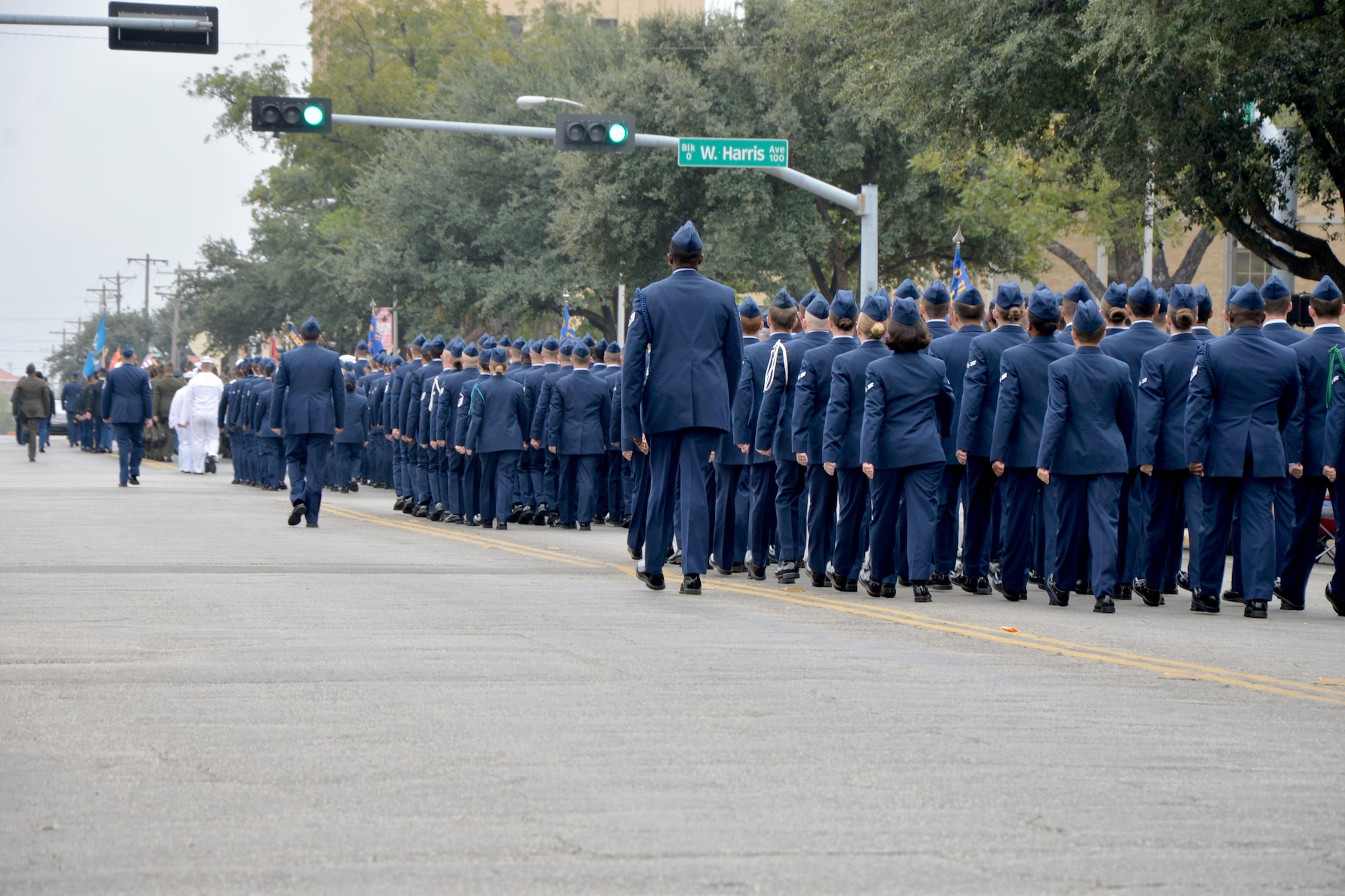 Goodfellow Air Force Base Airmen march in formation during the Veterans Day Parade in downtown San Angelo, Texas, Nov. 5, 2016. The parade featured veterans, active duty, marching bands and more. (U.S. Air Force photo by Airman 1st Class Randall Moose/Released)