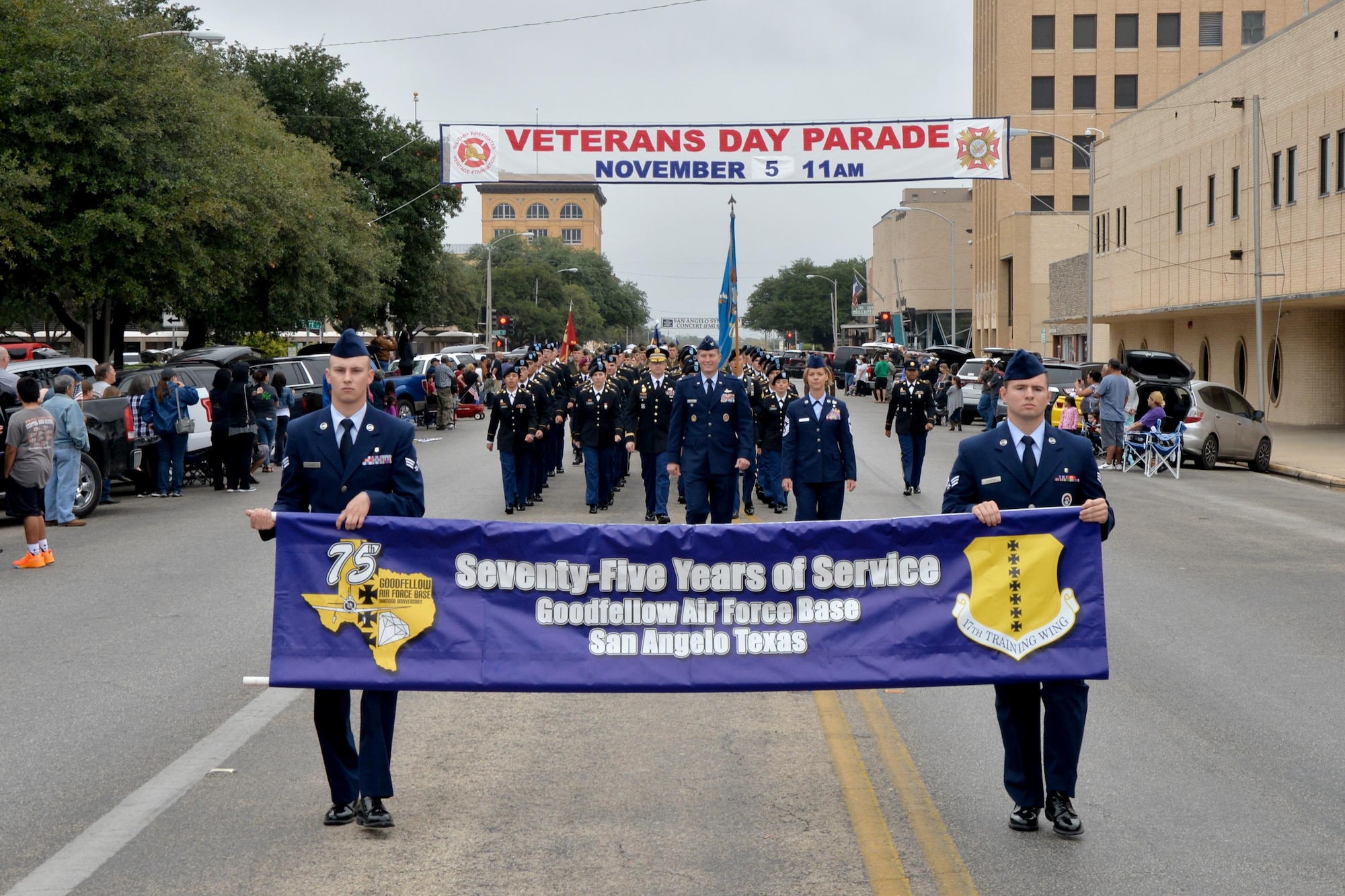 Goodfellow Air Force Base service members march in formation during the Veterans Day Parade in downtown San Angelo, Texas, Nov. 5, 2016. This was the 13th time the Tom Green County’s All Veterans Council hosted the parade. (U.S. Air Force photo by Airman 1st Class Randall Moose /Released)