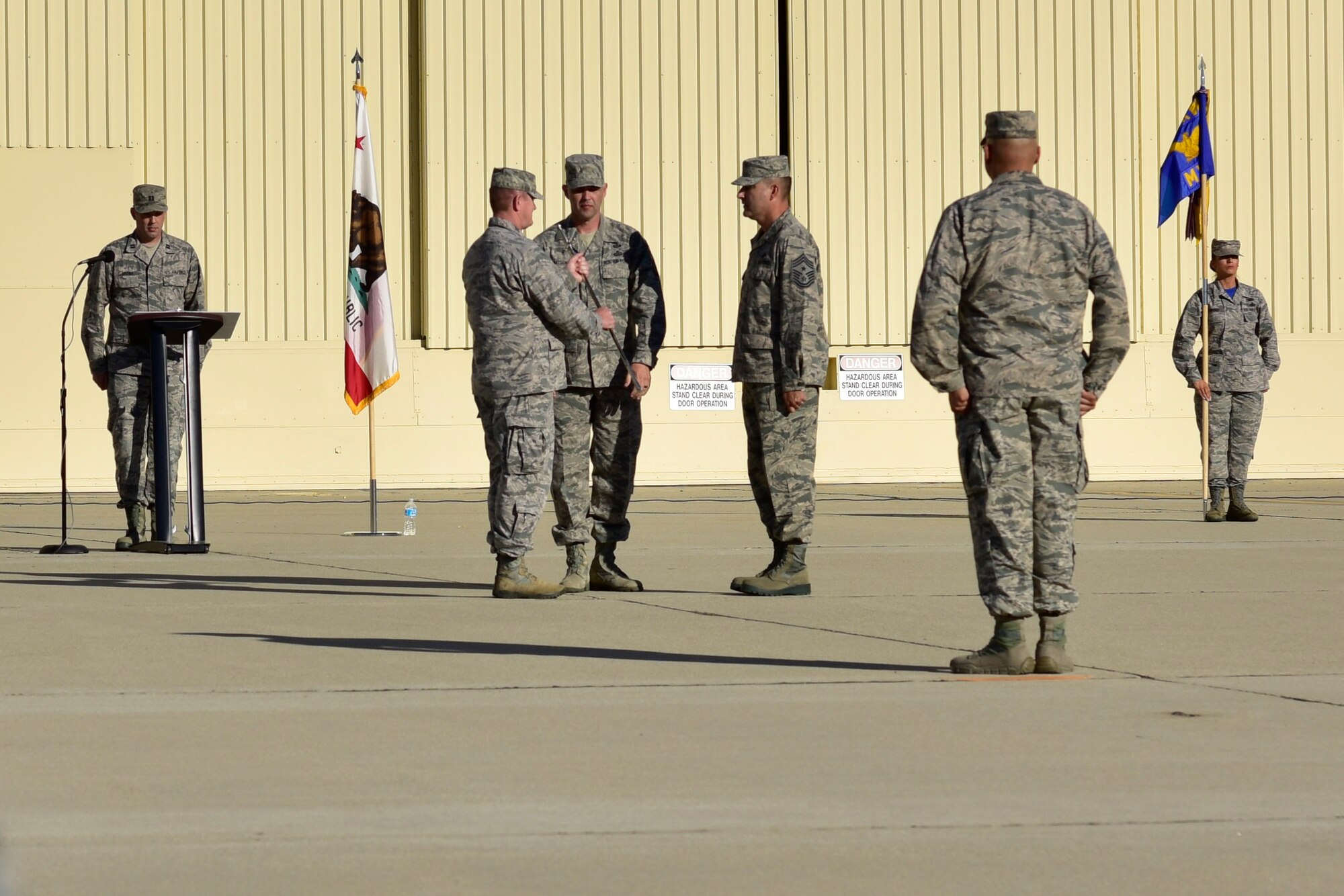 Chief Master Sgt. Gilbert Sanchez accepts an NCO sword Oct. 1, 2016, during an assumption of authority ceremony held at March Air Reserve Base, California, as he becomes Command Chief of the 163d Attack Wing. Sanchez joined the wing in 1998 after serving five years of active duty. During his career, Sanchez has worked in munitions and logistics. He served as first sergeant three times and also worked as the wing's human resource advisor. (U.S. Air National Guard photo by Tech. Sgt. Joseph McKee)