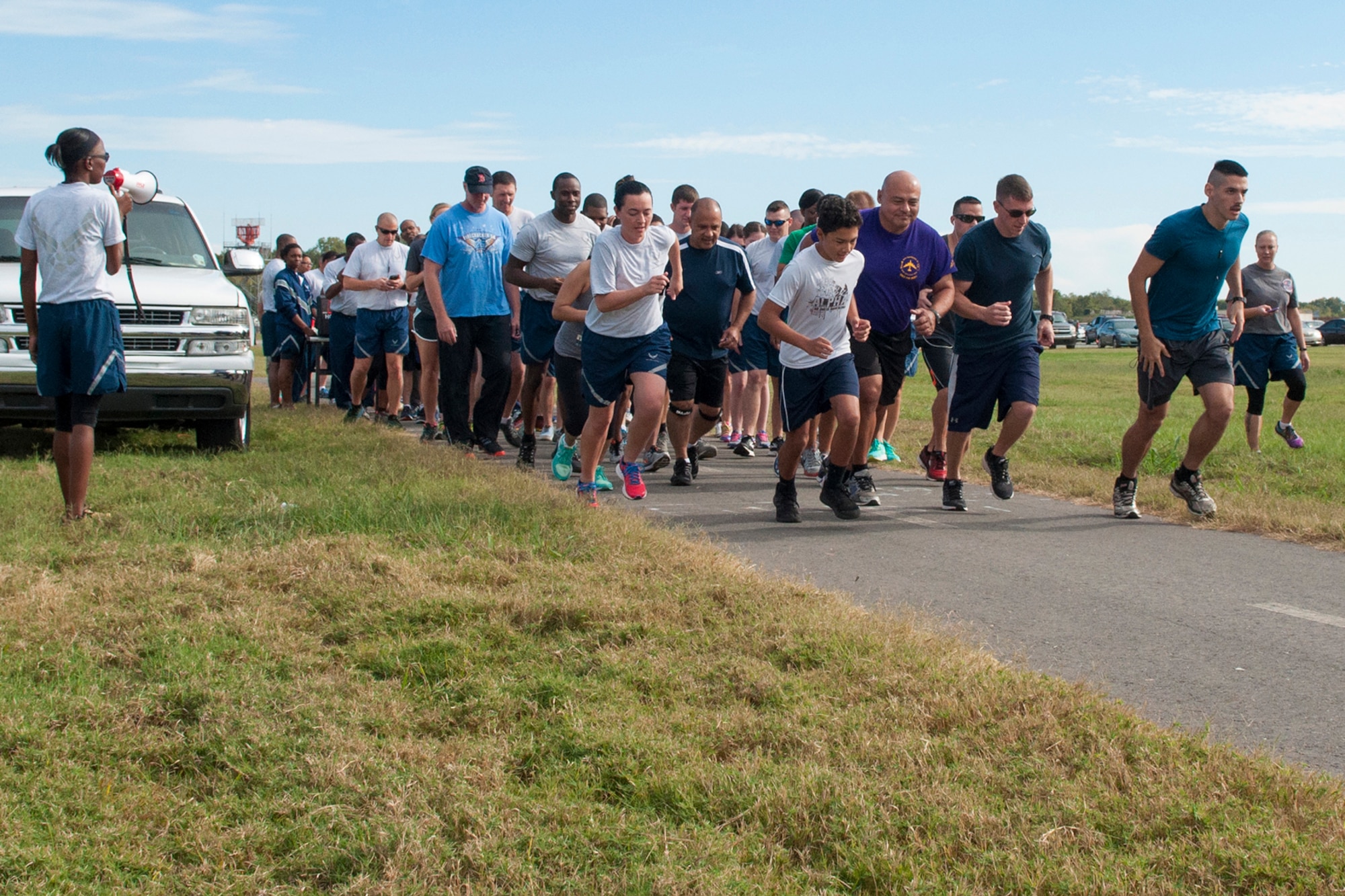 Runners begin a 5K run during the 2016 Turkey Trot hosted by the 307th Force Support Squadron on Nov. 5, 2016, Barksdale Air Force Base, La. Each participant was entered into a drawing for a Thanksgiving turkey. (U.S. Air Force photo by Tech. Sgt. Cody Burt/Released)