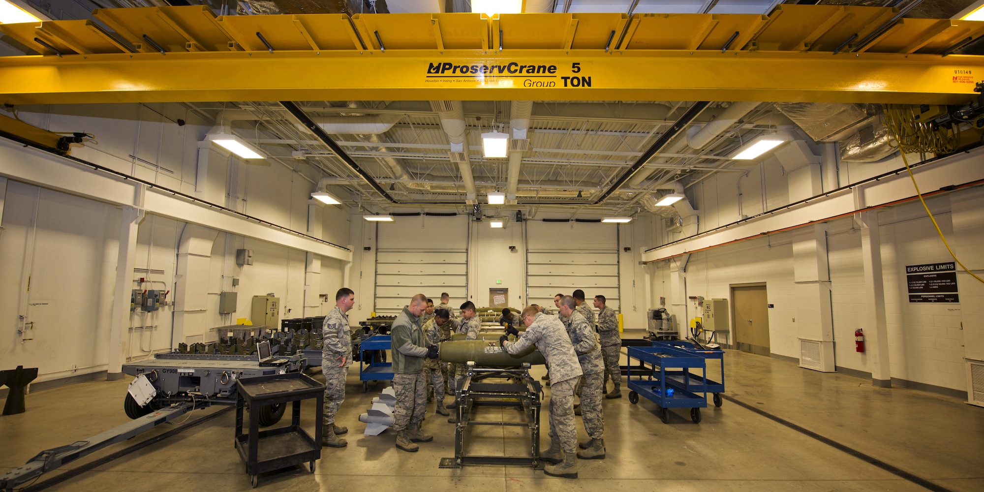 Airmen from the 5th Munitions Squadron assemble inert GBU-38s at Minot Air Force Base, N.D., Oct. 27, 2016. Airmen assembled four guided bomb units as a part of training for an upcoming deployment. (U.S. Air Force photo/Airman 1st Class J.T. Armstrong)