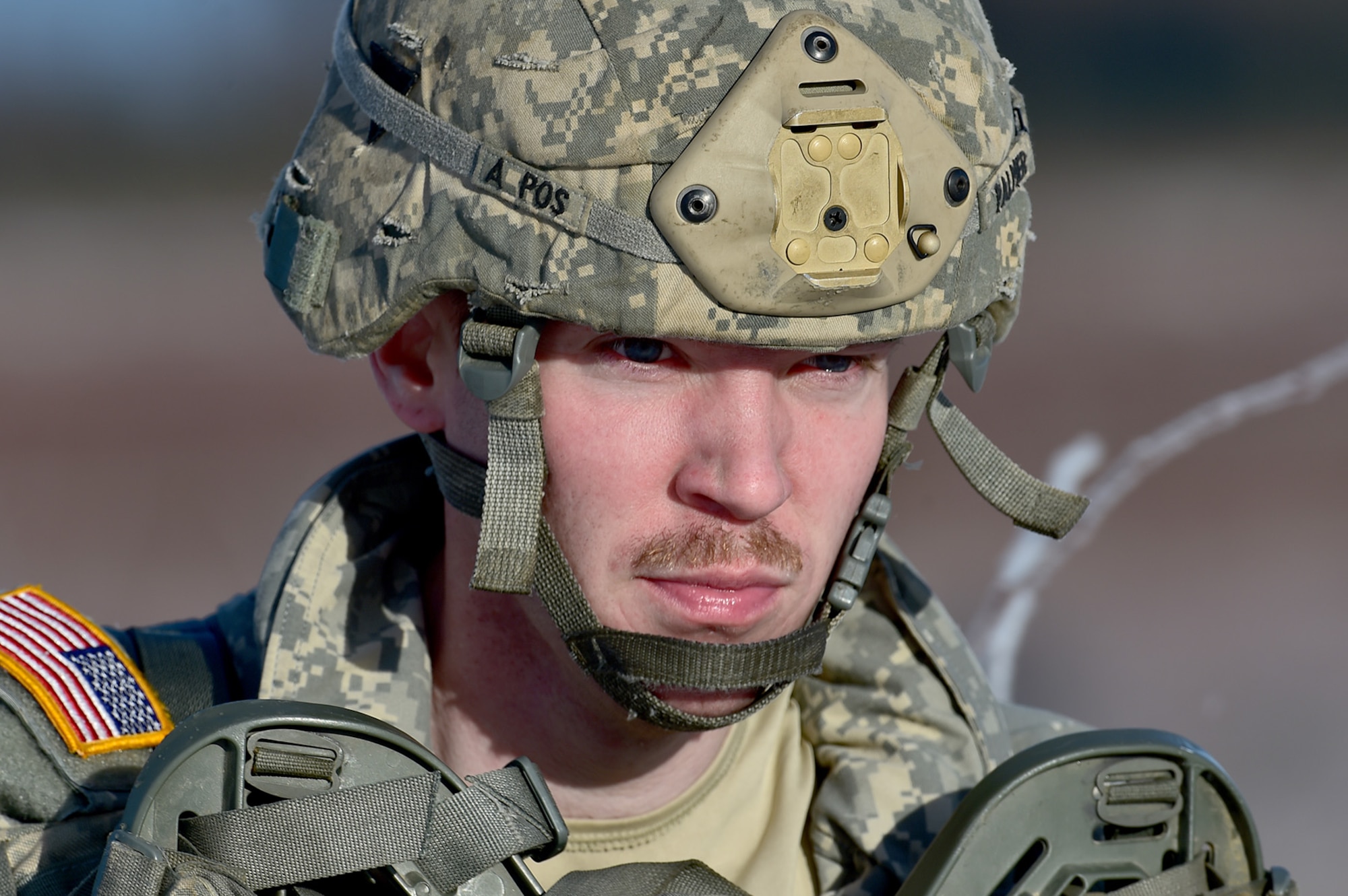 Spc. Joshua Palmer, a native of Branford, Conn., assigned to Easy Company, 6th Brigade Engineer Battalion (Airborne), 4th Infantry Brigade Combat Team (Airborne), 25th Infantry Division, U.S. Army Alaska, walks to a parachute collections point after an airborne training jump from a CH-47 Chinook helicopter on Malemute drop zone at Joint Base Elmendorf-Richardson, Alaska, Thursday, Nov. 3, 2016. The Soldiers of 4/25 IBCT belong to the only American airborne brigade in the Pacific and are trained to execute airborne maneuvers in extreme cold weather/high altitude environments in support of combat, partnership and disaster relief operations. 