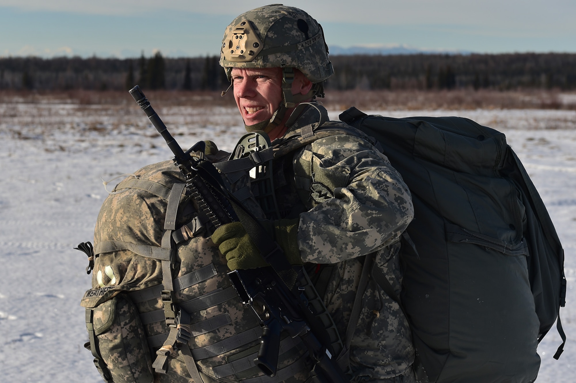 U.S. Army Sgt. 1st Class Danon Weatherd, a native of Windyville, Mo., assigned to Fox Company, 2nd Battalion, 377th Parachute Field Artillery Regiment, 4th Infantry Brigade Combat Team (Airborne), 25th Infantry Division, U.S. Army Alaska, gathers his equipment after an airborne training jump from a CH-47 Chinook helicopter on Malemute drop zone at Joint Base Elmendorf-Richardson, Alaska, Thursday, Nov. 3, 2016. The Soldiers of 4/25 IBCT belong to the only American airborne brigade in the Pacific and are trained to execute airborne maneuvers in extreme cold weather/high altitude environments in support of combat, partnership and disaster relief operations. 