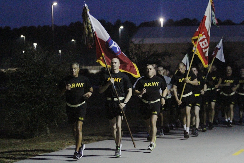 Lt. Gen. Michael X. Garrett (left), U.S. Army Central commanding general, and Command Sgt. Maj. Eric Dostie (right), U.S. Army Central senior enlisted advisor, lead USARCENT in an esprit de corps run Nov. 4, on Shaw Air Force Base, S.C. The run kicked off the USARCENT organization day. 