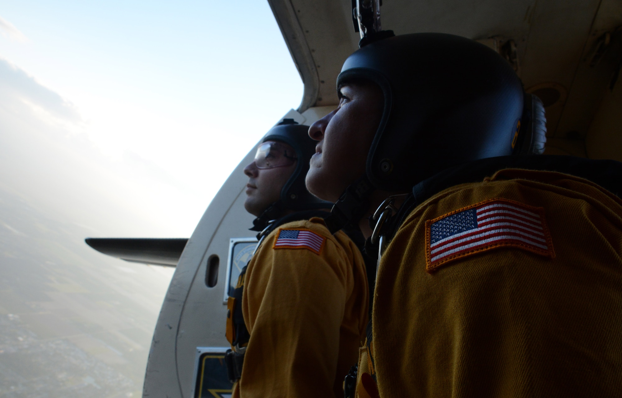 SSG Brandan Parra and SFC Jennifer Espinosa, U.S. Army Golden Knights Gold Demonstration Team admire the wild blue yonder during their 2016 Wings Over Homestead Air Show demonstration, Homestead Air Reserve Base, Fla., Nov. 5, 2016. The 2016 Wings Over Homestead Air Show attracted over 100,000 visitors during Nov. 4 - 6. (U.S. Air Force photo by Staff Sgt. Desiree W. Moye)